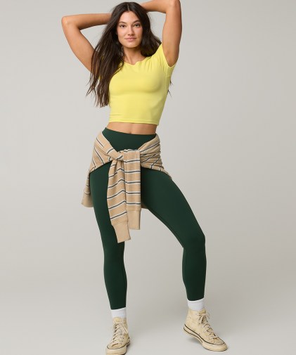 A person wearing a pair of OFFLINE by Aerie leggings.