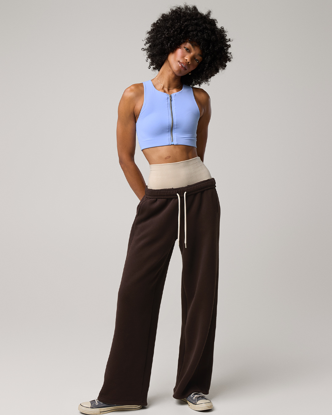 Woman in OFFLINE by Aerie baggy pants.