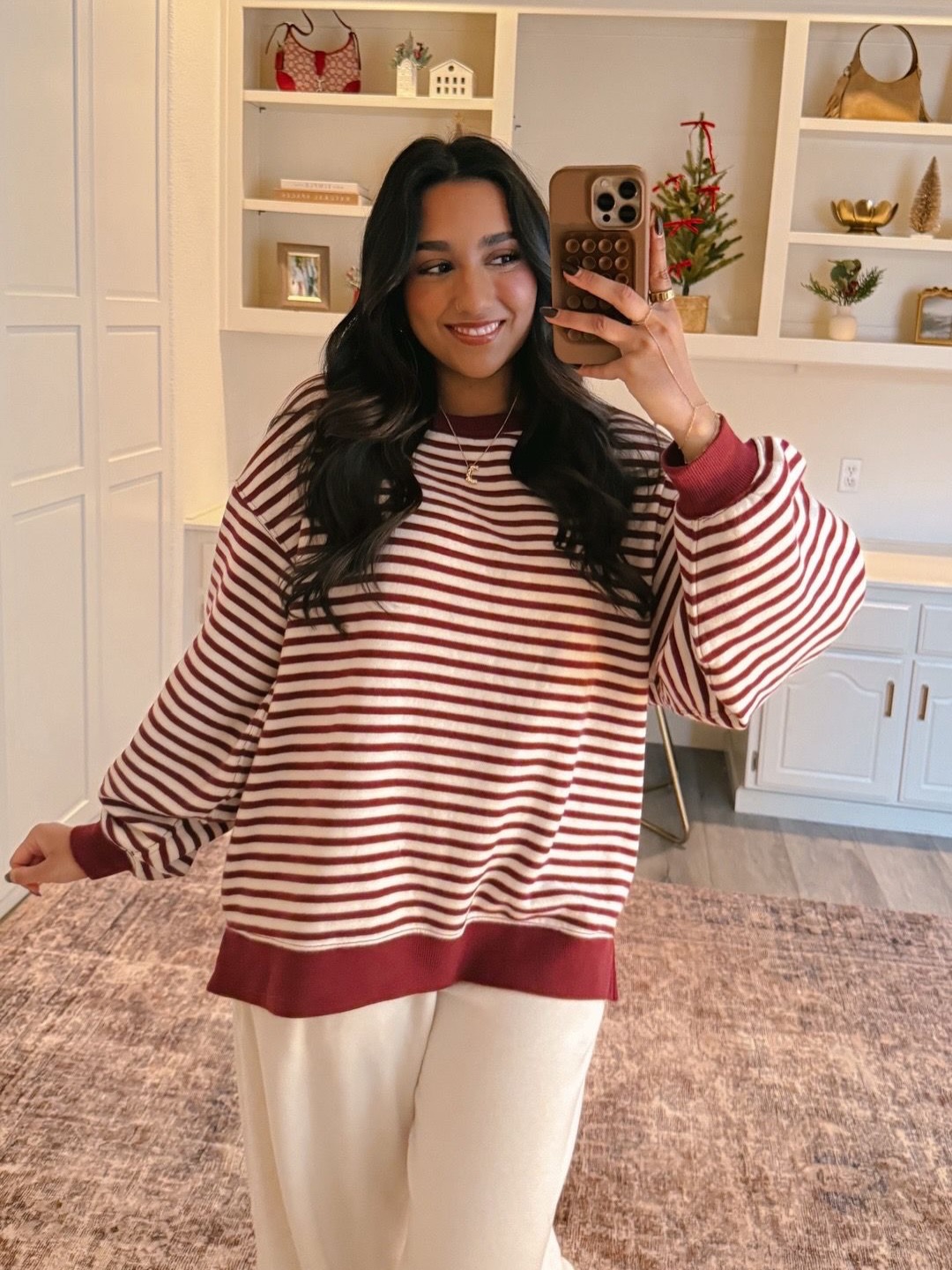 Woman in striped Aerie top.