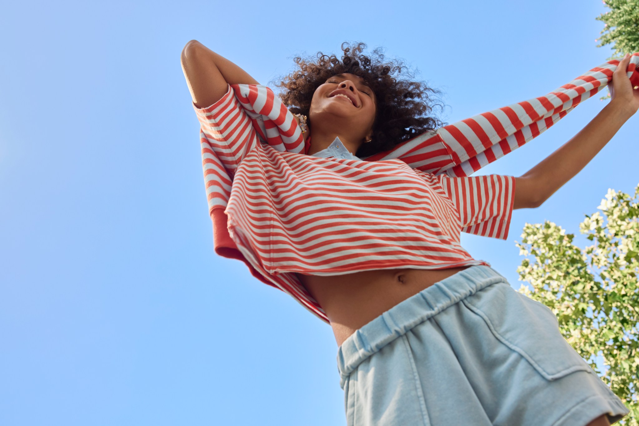 Woman in red and white striped shirt.