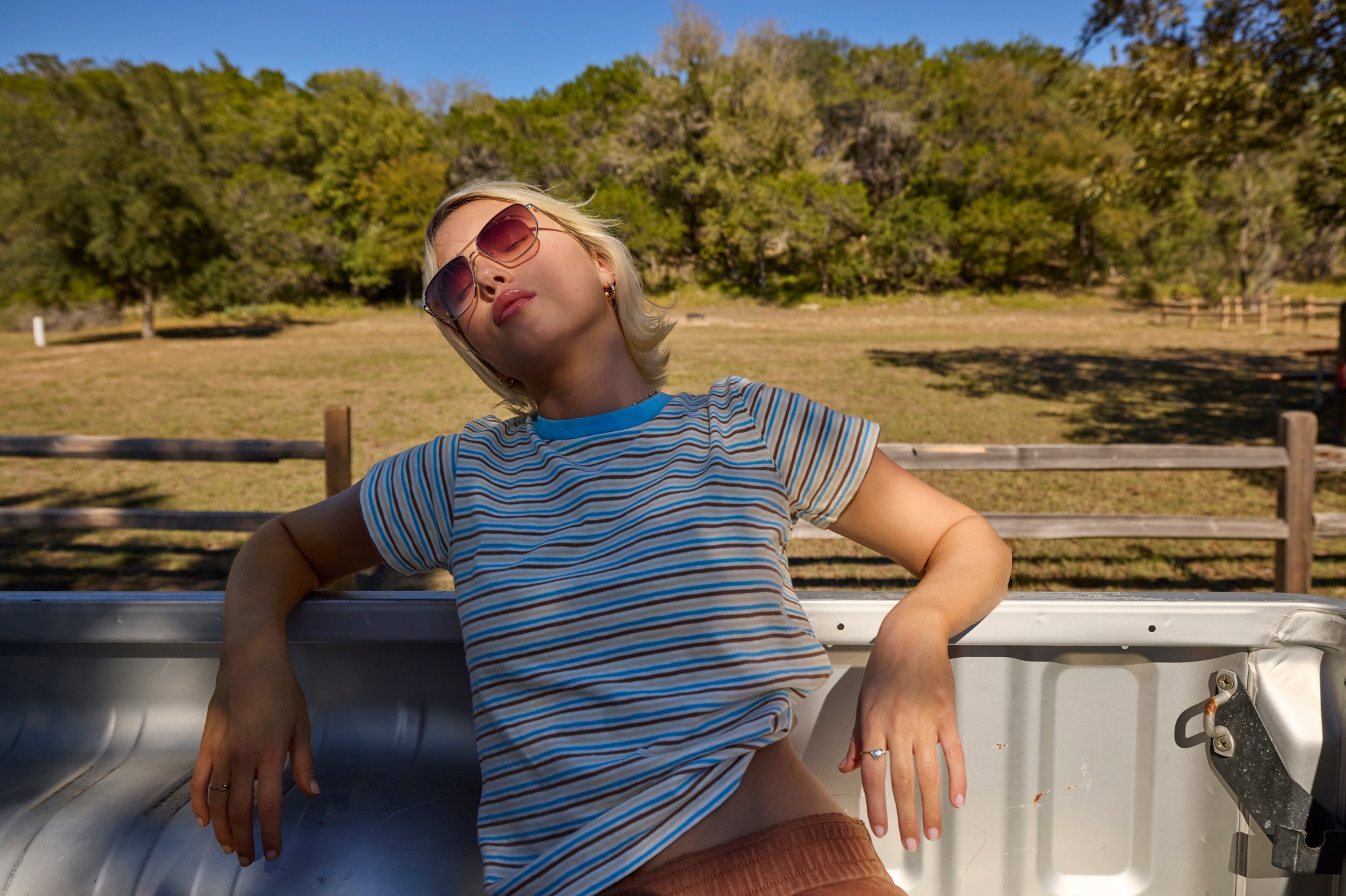 Woman in striped Aerie baby tee.