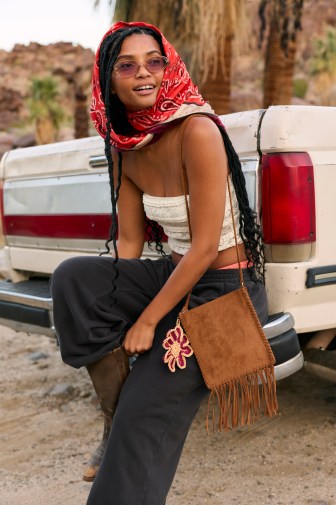 Woman wearing Aerie festival clothing.