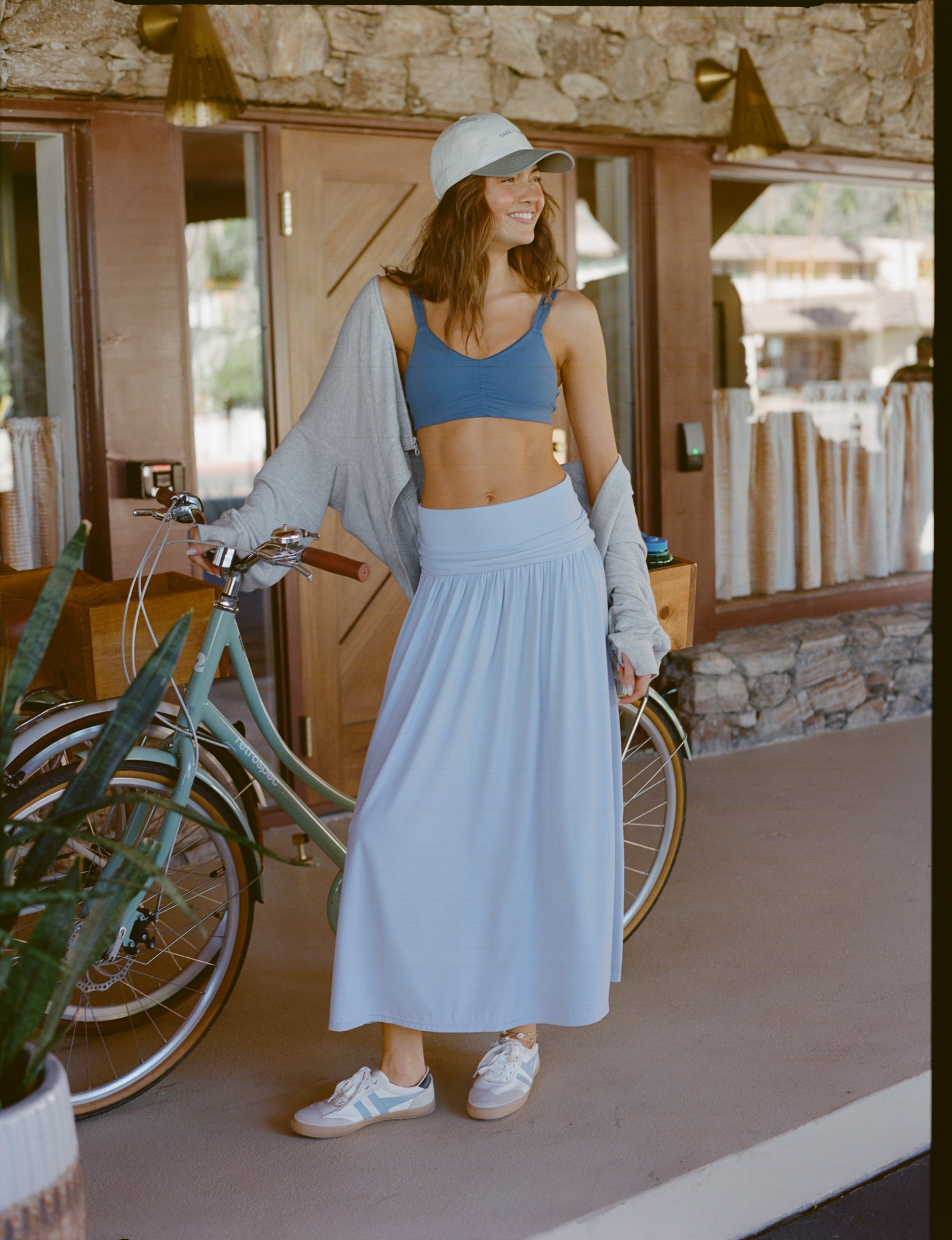 Woman in Aerie blue maxi skirt.