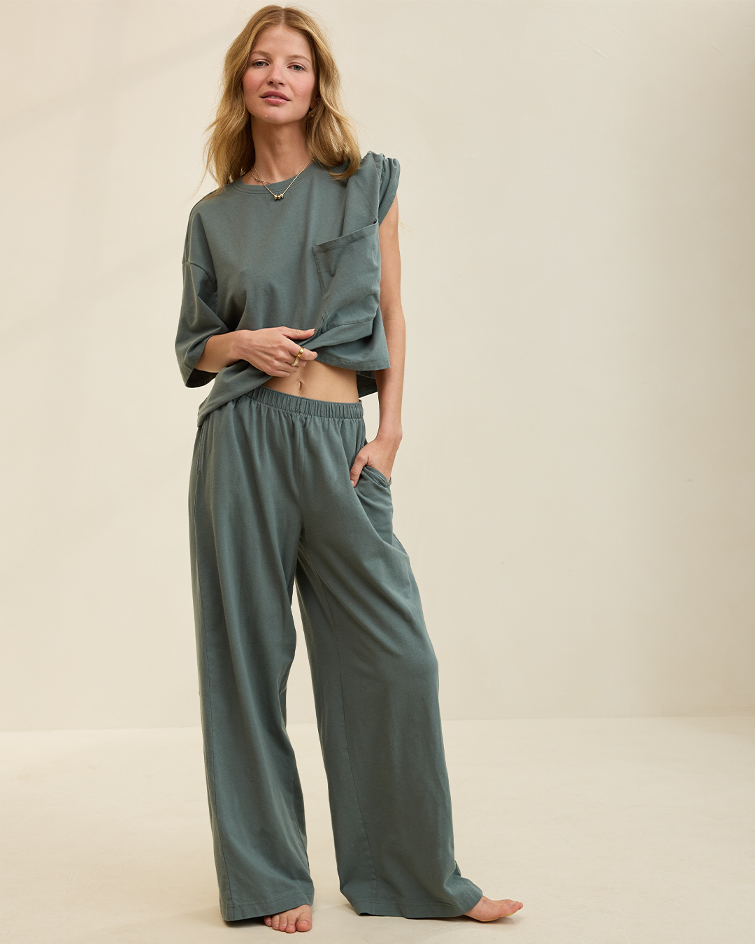 Woman in cotton matching set from Aerie.