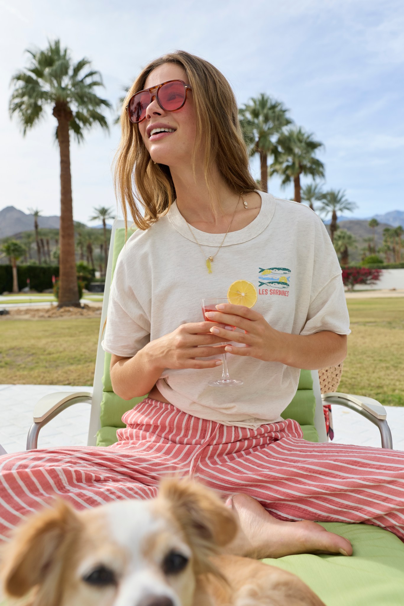 Woman wearing Aerie cover up top and flowy bottoms.