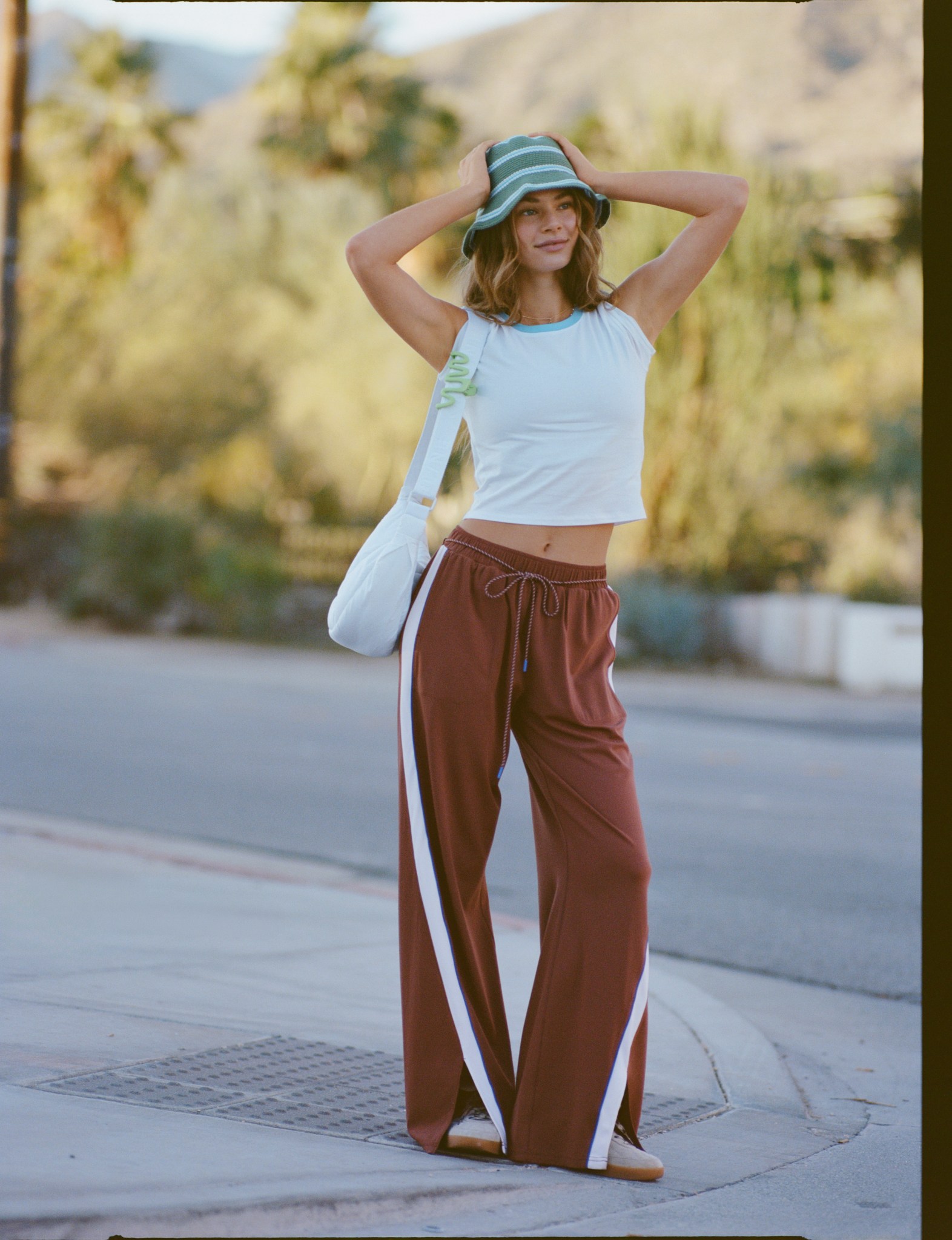 Woman in OFFLINE by Aerie workout top.