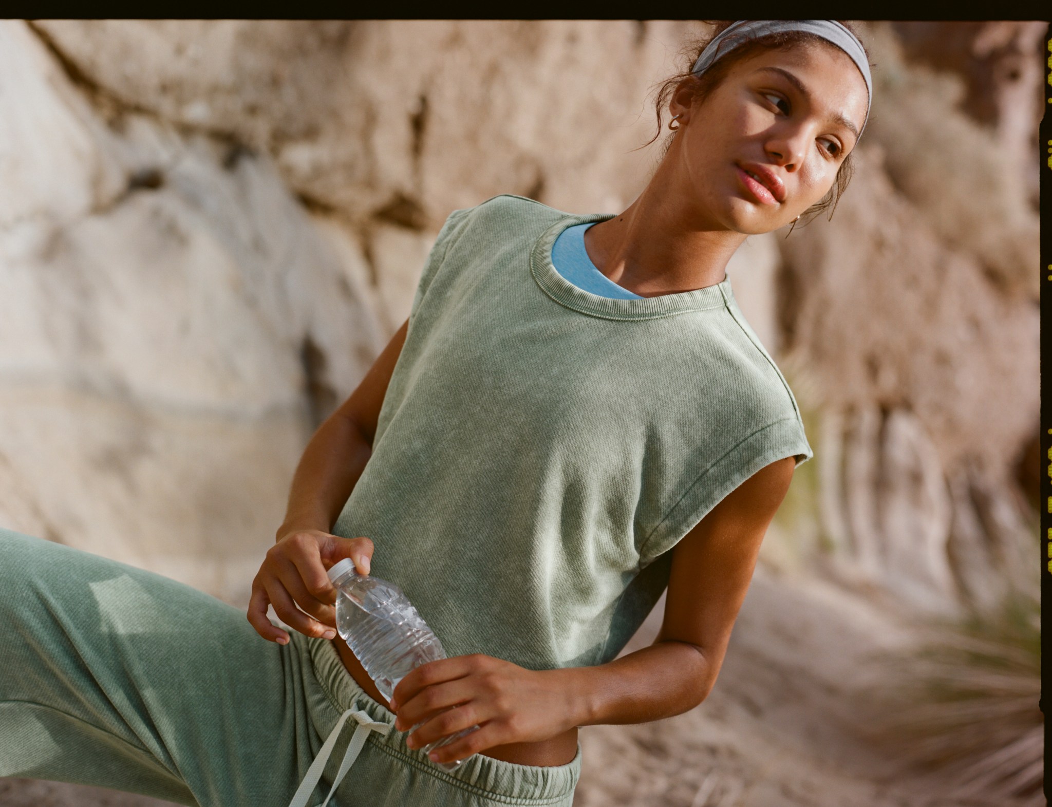 Woman in OFFLINE by Aerie workout top.
