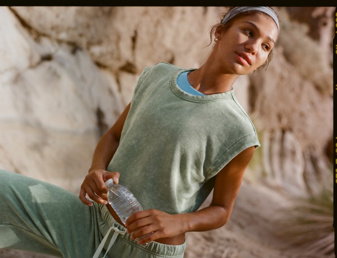 Woman in OFFLINE by Aerie workout top.