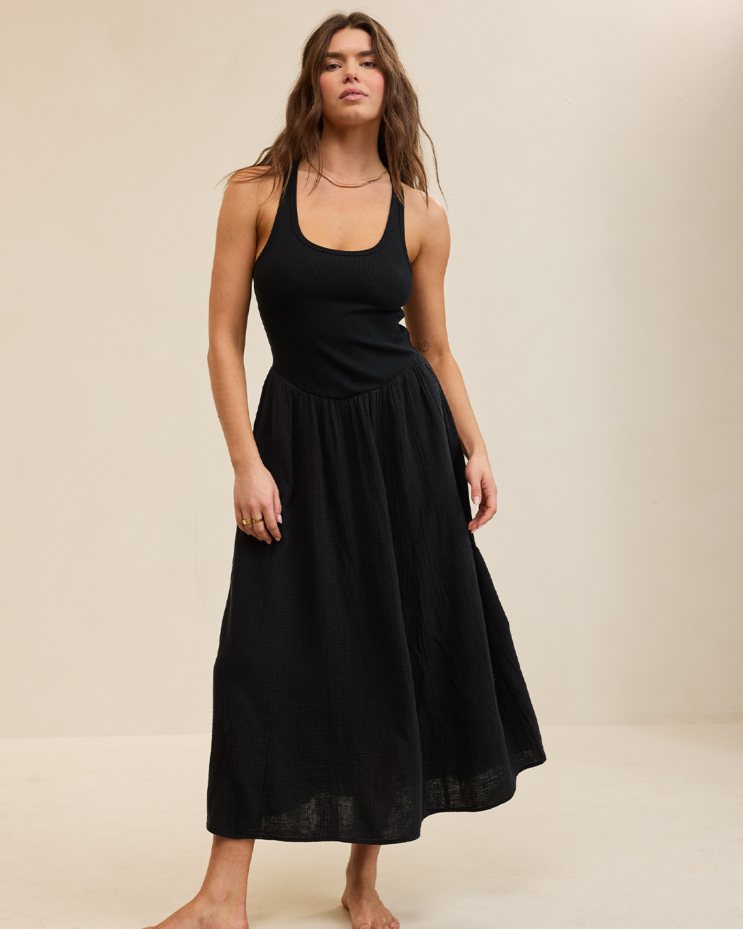 Woman in a black maxi dress.