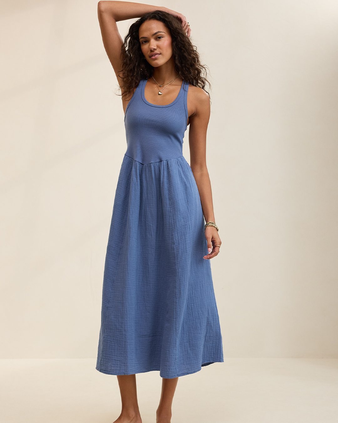 Woman in navy sundress.