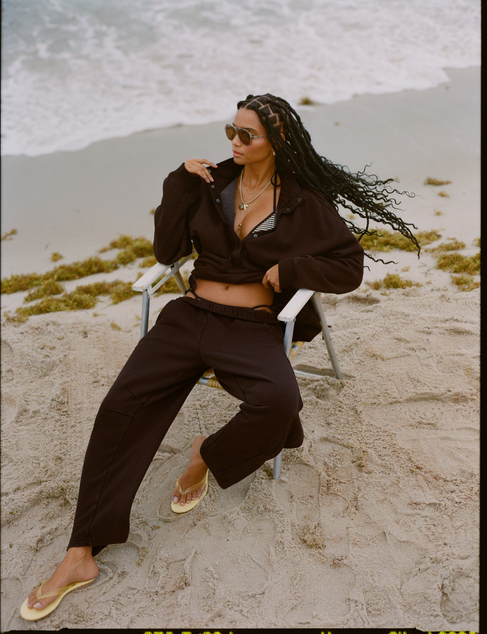 Woman wearing dark Aerie matching loungewear set.