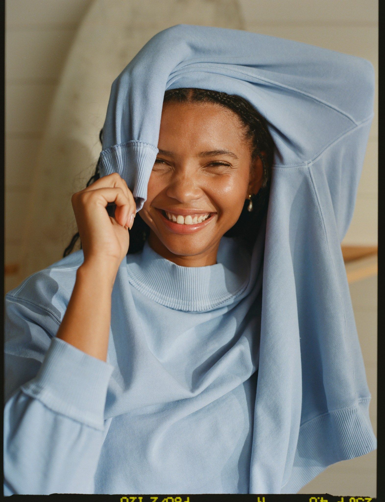 Woman wearing an oversized, cozy Aerie top.