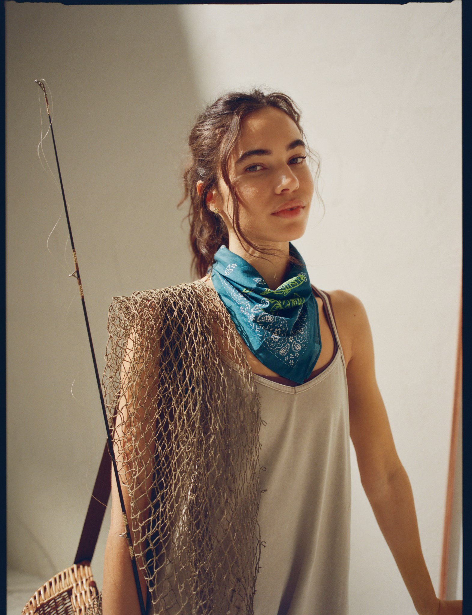 Woman wearing outdoor accessories from OFFLINE by Aerie.