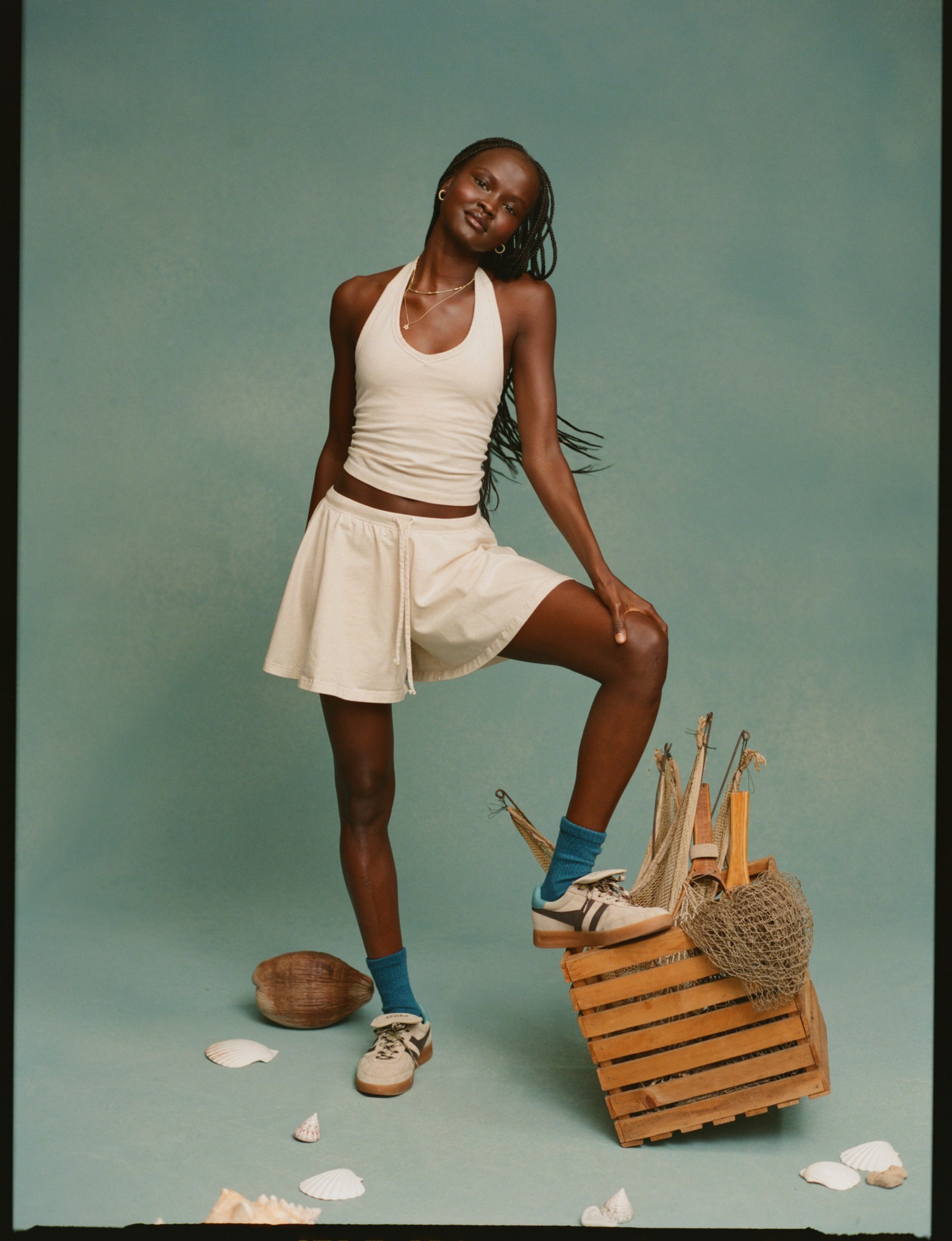 Woman wearing an ivory matching set.